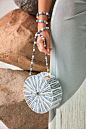 Acrylic Luna Crossbody - Sage Multi : A beautiful heirloom piece. The beaded strap is made of real stones and is detachable. Acrylic beaded bag with a magnetic flat closure.    Our first crossbody bag. Detachable strap is an acrylic circle body.   Details
