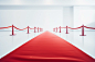 Path of Red carpet, Red rope on white floor. hyperrealistic,dutch eye shot,Sony α7R V DSLR realistic Accent