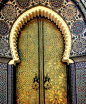 incredible star-patterned golden arched doorway and ornamental tilework, Fez, Morocco.