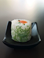 很特别的一道寿司，外皮是混进了迷迭香制成的糯米薄皮，口感十分独特。这款寿司出自日本大师柿泽先生之手。