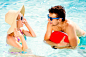 Couple with sunglasses in swimming pool. Summer, sun, water. by Jozef Polc on 500px