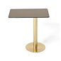 Buy Tom Dixon Flash Table - Rectangle | Amara : Bring antique style to your interior with this Flash Table Rectangle from Tom Dixon. Its sophisticated design sees a bronze mirrored glass table top sit above an off centre, brass plated steel base. I