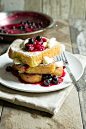 Brioche topped with mascarpone cheese and mixed berry compote