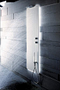 Minimalist white and grey bathroom, Acquapura shower light by Fantini _