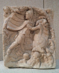 Votive relief to Mithras, the oriental god Mithras kills the sacred bull and from its blood and semen arise the plants and animals, 2nd century AD, Neues Museum, Berlin