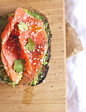 Seeded rye bread with avocado and smoked salmon