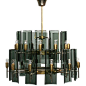 Curved glass and brass chandelier attributed to Fontana Arte | From a unique collection of antique and modern chandeliers and pendants  at <a class="text-meta meta-link" rel="nofollow" href="http://www.1stdibs.com/furniture/lig