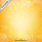 Yellow bokeh background in bright style Free Vector