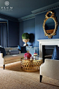 Blue living room charisma design. I like everything except the mirror.: 