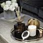 Ottoman styling detail shot. I love these @daylesfordorganic geranium candles�