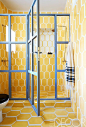 I would be afraid I would tire of these yellow tiles, but that shower door is everything!  @MyDomaine: 