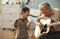 Caucasian man and grandson playing musical instruments together by Gable Denims on 500px