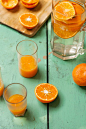 Orange Juice on a green background by Heather Balmain on 500px