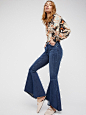 Free People Johnnie’s Extreme Wide Leg : Johnnie’s Extreme Wide Leg | Wide leg jeans featuring extreme distressing.  

* Lightweight, rigid denim  
* Low-rise  
* Five-pocket style  
* Button closure and zip fly  

**Fit:**  May run large, we recommend si