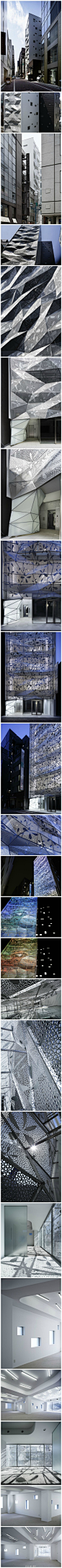 @设计联-图库
梦幻的建筑外观： 这是一个折叠起伏的办公大楼，通体呈银色，是由日本建筑公司Amano设计的。整个建筑采取双层的结构，从视觉方面给人以震撼和愉悦。内部设有LED照明灯，可以根据季节和时间的改变而改变亮度。在光线暗时，这栋“银座”格外显眼。@設計物語LAI @ATENO天诺国际 http://t.cn/z81OUIS