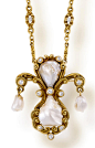 Lot-4-An-antique-freshwater-pearl-diamond-and-fourteen-karat-gold-pendant-necklace-Marcus-Co.-circa-19051.png