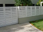 White fence with thick and thin panels - $160 per metre