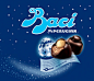 Bacio Perugina——吻：Baci是由里面的纯巧克力和一个果仁组成。形状很可人，味道纯正浓郁，外面包装以蓝色星星图案主打，十分抢眼。在意大利的各个城市各个角落都可以窥探到它的身影。尤其是情人节到来的时候Baci的身价和销量更是红得发紫。难怪情人节有送巧克力之说，也许就是它的功劳呢！可见Baci在意大利人心中的地位有多重。意大利民族浪漫的特质是升华在生活中各个层面中的，不管水都威尼斯唱情歌的船夫，或者是徐志摩笔下的翡冷翠，到处都有另人难忘的感动。