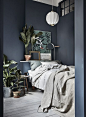 Gravity Home: Small Bedroom with Plants in a Tiny Blue Stockholm Apartment: