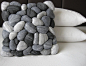 So cute/clever. Trompe l'oeil 3D "river rocks" made from marbled, felted wool on a throw pillow. For the Farm.