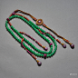 An imperial tourmaline and jadeite prayer necklace,Qing dynasty.Diameter: 1.2cm