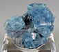 mineralists:

Deep blue phantomed Fluorite with Pyrite sits atop of a sparkling drusy matrix from Le Burg Mine, France