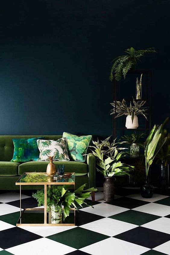 Green sofa dark wall...