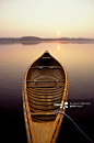 Canoe docked on lake