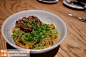 @NOBU Beijing 的#安格斯牛肉炒面# ：安格斯牛（Angus）是黑色无角肉用牛。多年来称为亚伯丁安格斯牛(Aberdeen Angus)，起源于苏格兰东北部，与有时称为英国最老品种的卷毛加罗韦牛(curly-coated Galloway)亲缘关系密切。19世纪初很多育种家包括著名的华特生(Hugh Watson)等改良了这个品种，固定了该品种现在的体型。外貌特征是黑色无角，体躯矮而结实，肉质好，出肉率高。纯种或杂交的安...