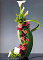 Flower arrangement 'Dakar' -  Calla (zantedeziâ), iridifolium Carnation, chrysanthemum, bupleorum, asparagus - Floristic Bureau Avangardi (Ukraine)