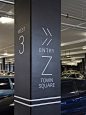 Eastland Wayfinding and Signage : Spaceagency was asked to re-imagine the role of shopping in the future. The wayfinding and signage design was driven by a minimal and sophisticated vision that challenges the conventional notions of signage in a retail en