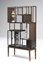 Display case composed of 9 vitrines welded to a metal base. The vitrines are realized with metal profiles that are cut, milled, folded, hand-welded and coated with a burnished copper metallic enamel; the sides of each unit are in 4mm extra clear glass: