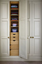 Closet doors + drawers. I would love a wall of storage like this. It reminds me of my Grandma's. She had an awesome hallway of storage, and you never knew what kind of goodies you'd find in there.: