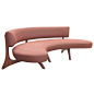 A biomorphic walnut sofa with curved backrest and a floating platform seat set on sculptural carved legs which blend seamlessly into the support for the back.  A reproduction of the amazing design of Vladimir Kagan.
