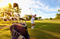Photograph Caucasian golfer hitting ball on golf course by Gable Denims on 500px