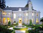 A parterre of roses surrounds a fountain at the entrance of a 1922 French-style mansion in Piedmont, California.