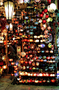 Lamp store at Grand Bazaar, Istanbul, Turkey. The Grand Bazaar (Turkish: Kapalıçarşı) in Istanbul is one of the largest and oldest covered markets in the world, with 61 covered streets and over 3,000 shops which attract between 250,000 and 400,000 visitor