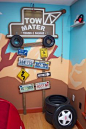 Radiator Springs, I have a three year old who is infatuated with Lightning McQueen and the world of Cars, so when we moved to a new home, I took the opportunity to create a little slice of Radiator Springs for him to live in., The Tow Mater sign is home-m