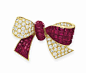 A ‘MYSTERY-SET’ RUBY AND DIAMOND BOW BROOCH, BY VAN CLEEF & ARPELS – Christie’s