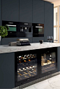 Miele Kitchen. I spy a decanter (which always comes in handy). Clean lines. Marble counter top. Built in wine cabinet. Lovely.