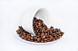 Coffee Beans on White Ceramic Saucer