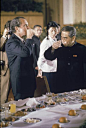 US President Richard Nixon and Chinese Premier Chou Enlai toasting with maotai while dining in Great Hall of People, during Nixon's trip to China.