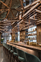 Luxury bar design featuring geometric brass ceiling panels and lighting - Located in the heart of Vienna's Golden Quarter, Gatserelia Designs have developed 'AI Restaurant', an innovative Asian restaurant taking the city by storm with its unique and edgy 