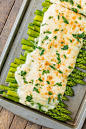 Three Cheese Asparagus Gratin; Asparagus under a creamy blanket of cheese. What could be better?? The perfect EASY Thanksgiving side dish!
