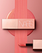 Photo by NARS Cosmetics on July 26, 2023. May be an image of one or more people, makeup, lipstick, cosmetics and text.