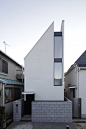 A small three-story house is built on a 40m2 lot: 