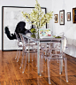 Big Impact in a Small Space. Ghost chairs and a narrow table create big dining in a tiny space. Love the splash of BIG fun art.