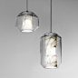 Lee Broom has designed Chamber, a light made from Carrara marble and crystal, as part of his Nouveau Rebel collection.