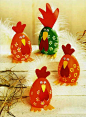 DIY crafts for Easter: these are Paper and bright red and green eggs dressed up like roosters