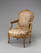 扶手椅（Fauteuil）制造商：路易·德拉诺瓦（Louis Delanois）（法国，1731-1792）。 1765年文化：法国，巴黎媒介：雕刻和镀金胡桃木； 丝绸锦缎内饰